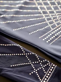 Dansebutikken Dragter Piger-Navy gymnastikdragt med mesh ærmer og sten piger The zone